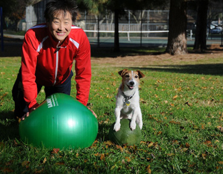 Dr. Sophia Yin working out with her dog